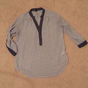 Sheer patterned work top. Size medium.